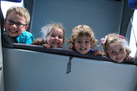 children in campervan