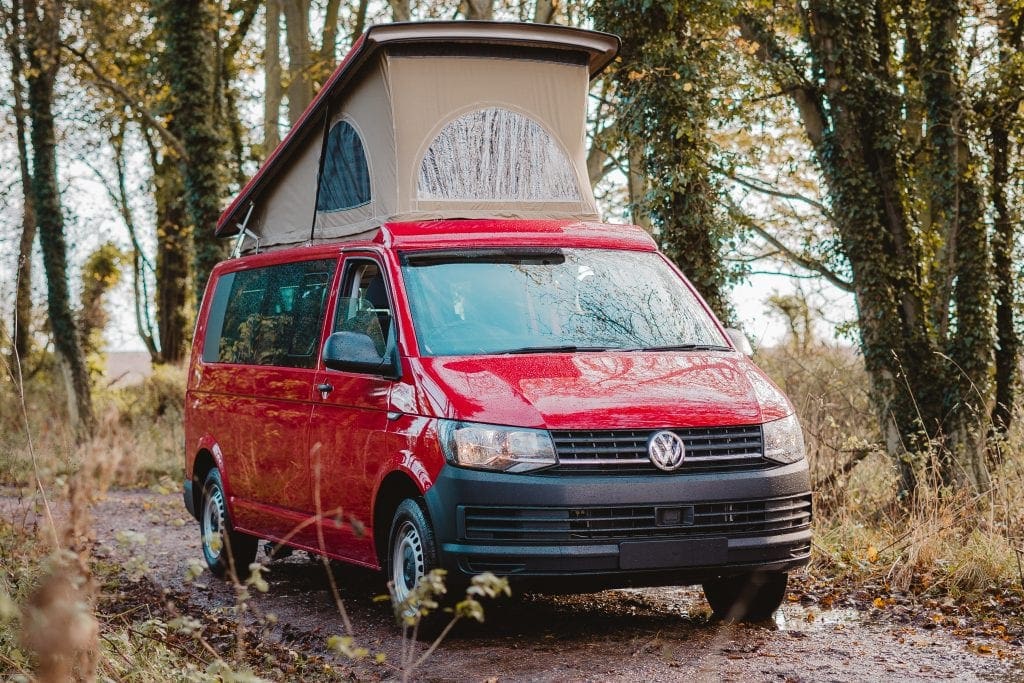 Red Campervan with a pop top roof