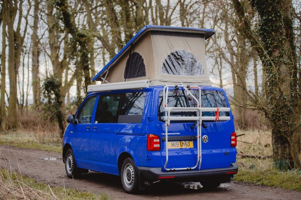 Blue Campervan with a Pop Top Roof