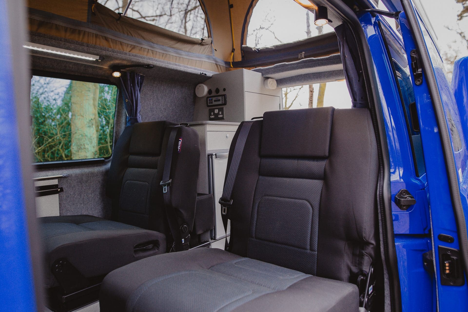 Campervan Interior - Black seats in the back