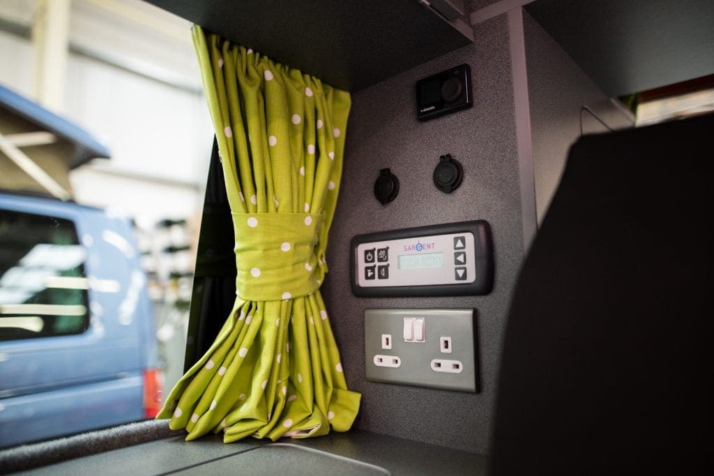 Campervan Interior - big window with a curtain