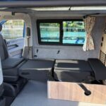 Rear Bed of a Dark Blue 2022 VW Transporter T6.1 Jerba Campervan, 22,500 miles.