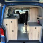 Inside of a Dark Blue 2022 VW Transporter T6.1 Jerba Campervan, 22,500 miles.