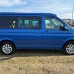 Offside of a Dark Blue 2022 VW Transporter T6.1 Jerba Campervan, 22,500 miles.