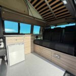 Inside of a Red 2023 VW T6.1 Transporter Jerba Campervans Tiree Conversion.