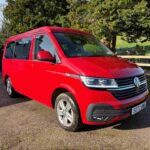 Frontside view of a Red 2023 VW T6.1 Transporter Jerba Campervans Tiree Conversion.