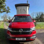 Front view of a Red 2023 VW T6.1 Transporter Jerba Campervans Tiree Conversion.