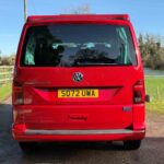 Rear view of a Red 2023 VW T6.1 Transporter Jerba Campervans Tiree Conversion.