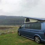 Nearside of a Blue 2017 VW Transporter T6 Jerba Cromarty Campervan, 16,500 miles.