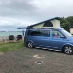 Side View of a Blue 2017 VW Transporter T6 Jerba Cromarty Campervan, 16,500 miles.