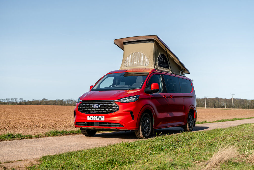 Front Side of a Red 2026 Ford Transit Custom Campervan Jerba Cromarty, 5000 Miles.