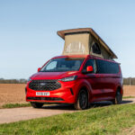 Front Side of a Red 2026 Ford Transit Custom Campervan Jerba Cromarty, 5000 Miles.