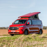 Front View of a Red 2026 Ford Transit Custom Camper, Jerba Sanna, 1000 Miles.
