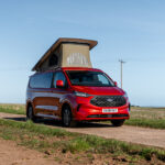 The Front of a Red 2026 Ford Transit Custom Campervan Jerba Cromarty, 5000 Miles.