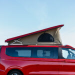 Elevating Roof of a Red 2026 Ford Transit Custom Campervan Jerba Cromarty, 5000 Miles.