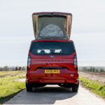 The Rear of a Red 2026 Ford Transit Custom Campervan, Jerba Sanna, 1000 Miles.