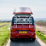 Rear View of a Red 2026 Ford Transit Custom Campervan Jerba Cromarty, 5000 Miles.