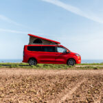 Side View of a Red 2026 Ford Transit Custom Campervan, Jerba Sanna, 1000 Miles.