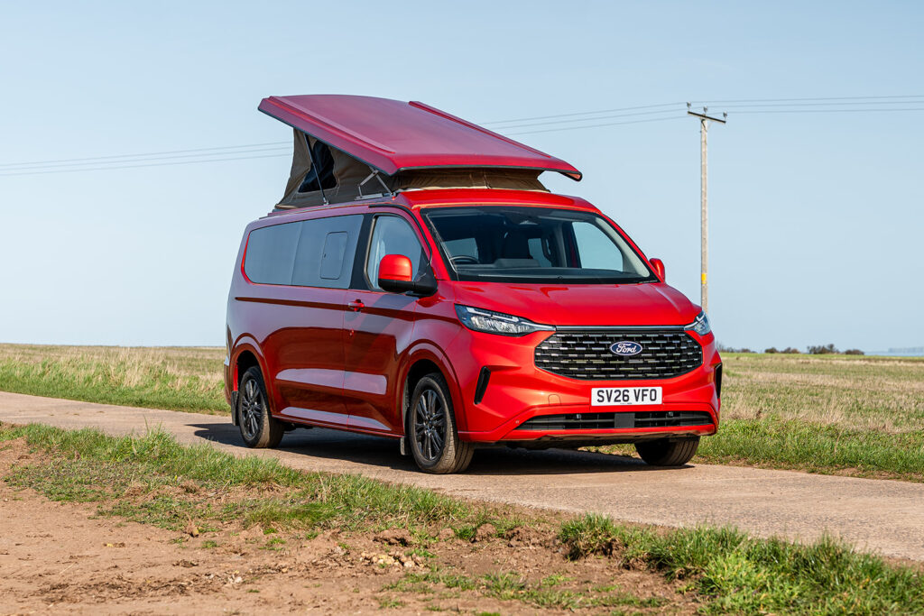 Front View of a Red 2026 Ford Transit Custom Campervan, Jerba Sanna, 1000 Miles.