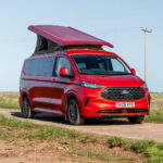 Front View of a Red 2026 Ford Transit Custom Campervan, Jerba Sanna, 1000 Miles.