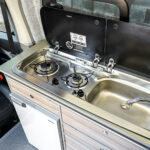 The Kitchen of a White 2026 Ford Transit Custom Campervan Jerba Tiree, 5000 Miles.