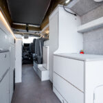 Rear Storage of a Red 2026 Ford Transit Custom Campervan, Jerba Sanna, 1000 Miles.