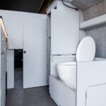 Privacy Door of a Red 2026 Ford Transit Custom Campervan, Jerba Sanna, 1000 Miles.