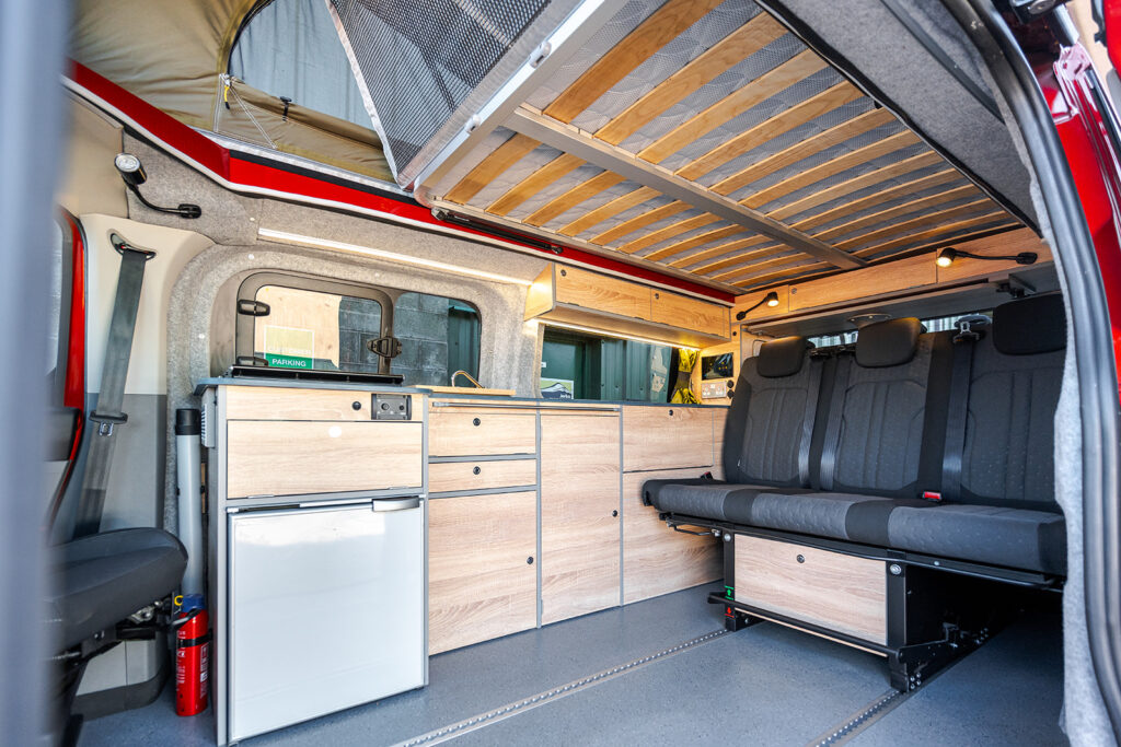 Roof Bed of a Red 2026 Ford Transit Custom Campervan Jerba Cromarty, 5000 Miles.