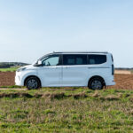 Nearside of a White 2026 Ford Transit Custom Campervan Jerba Tiree, 5000 Miles.