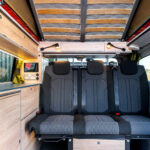 Rear Seats of a Red 2026 Ford Transit Custom Campervan Jerba Cromarty, 5000 Miles.