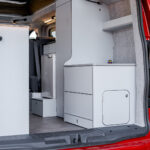 The Boot of a Red 2026 Ford Transit Custom Campervan, Jerba Sanna, 1000 Miles.