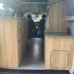 Rear Furniture of a Red VW Transporter T6.1 Campervan Jerba Sanna, 19,000 miles.