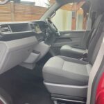 Front Cab of a Red VW Transporter T6.1 Campervan Jerba Sanna, 19,000 miles.