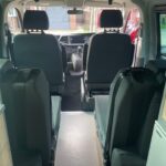 Inside View of a Red VW Transporter T6.1 Campervan Jerba Sanna, 19,000 miles.