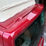 Rear Tailgate of a Red VW Transporter T6.1 Campervan Jerba Sanna, 19,000 miles.