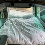 Rear Bed of a Red 2020 VW Transporter T6 Campervan Jerba Cromarty, 17,000 Miles.