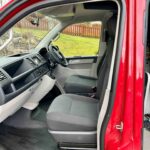 Front Cab of a Red 2020 VW Transporter T6 Campervan Jerba Cromarty, 17,000 Miles.