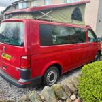Offside of a Red 2020 VW Transporter T6 Campervan Jerba Cromarty, 17,000 Miles.