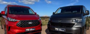 The front view of both a VW Transporter T7 and Ford Transit Custom side by side.