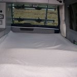 Double Bed of a Blue 2018 VW T6 Transporter Tiree Campervan, 43,500 Miles.