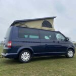 Side View of a Blue VW Transporter T5 2011 Campervan Conversion, 94000 miles.
