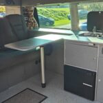 Rear Seats of a Blue VW Transporter T5 2011 Campervan Conversion, 94000 miles.