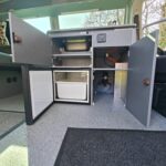 Kitchen Storage of a Blue VW Transporter T5 2011 Campervan Conversion, 94000 miles.