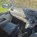 Passenger Seat of a Blue VW Transporter T5 2011 Campervan Conversion, 94000 miles.