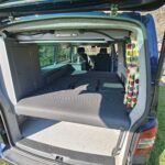 The Boot of a Blue VW Transporter T5 2011 Campervan Conversion, 94000 miles.