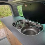 Combined Hob and Sink of a Beige 2013 VW Transporter T5 LWB Campervan, 87,000 Miles.