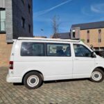 Offside of a White 2012 VW Transporter T5 SWB Tiree Campervan, 46,000 Miles.