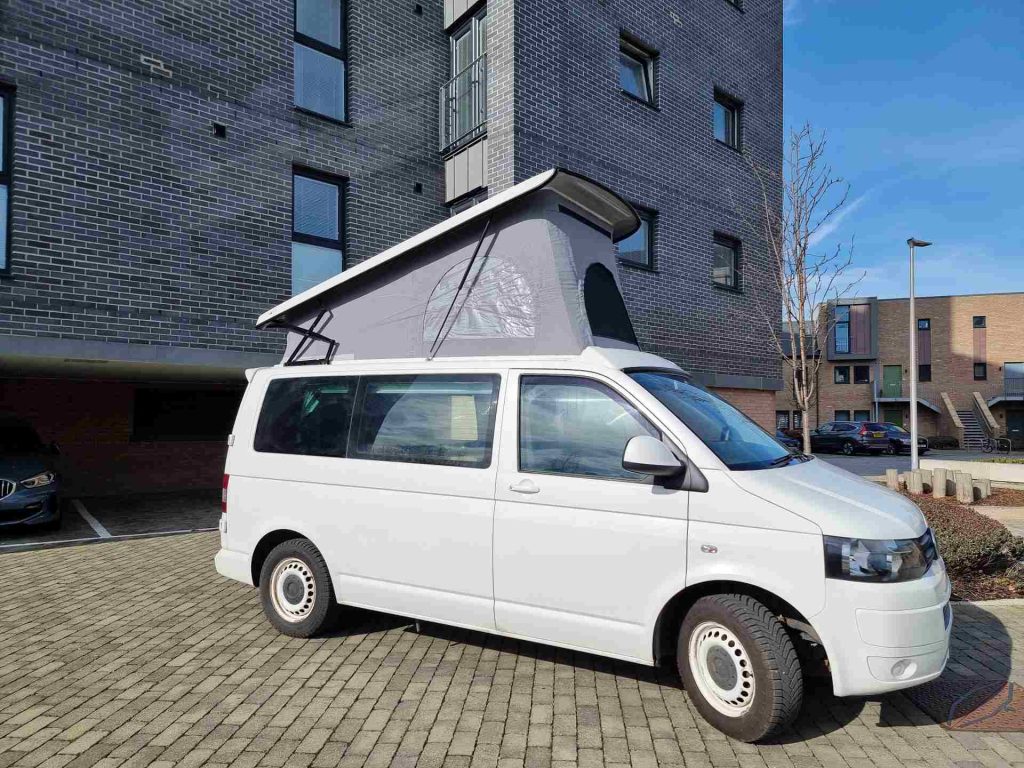 Side view of a White 2012 VW Transporter T5 SWB Tiree Campervan, 46,000 Miles.