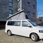Side view of a White 2012 VW Transporter T5 SWB Tiree Campervan, 46,000 Miles.