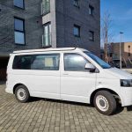 Side of a White 2012 VW Transporter T5 SWB Tiree Campervan, 46,000 Miles.